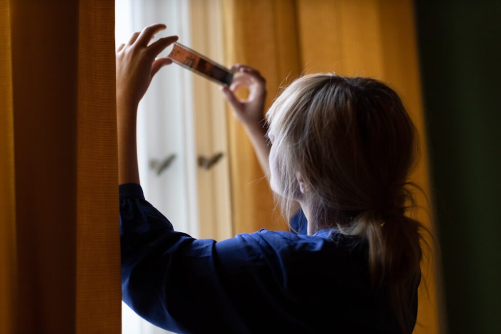 a person holding a door handle